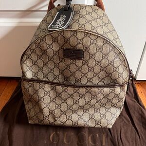 Authentic used Gucci Beige and Brown Backpack